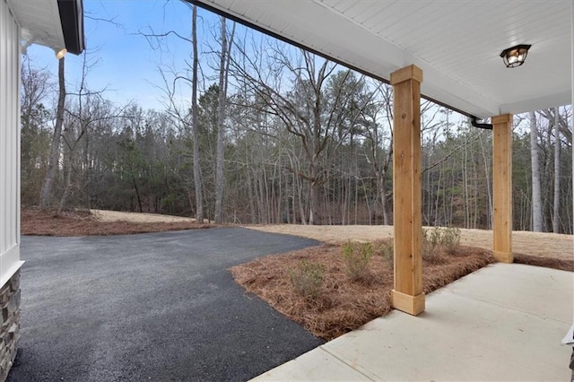 exterior space with a view of trees