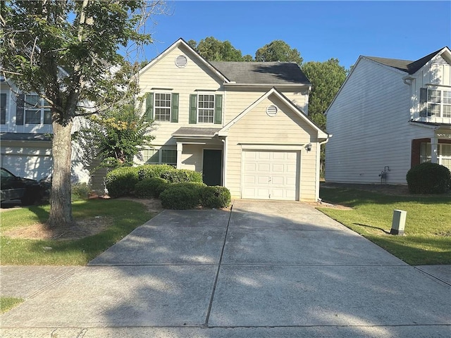 front facade featuring a garage and a front lawn