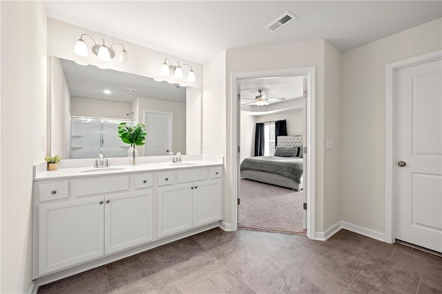 6372 Rosetta Dr SW, Atlanta, GA 30331 - full bath with double vanity, ceiling fan, baseboards, ensuite bath, and a shower with door