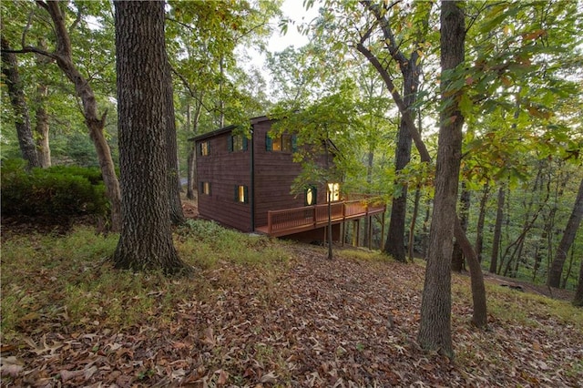 view of yard featuring a wooden deck