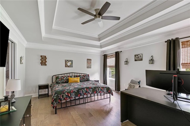 2241 N 16th Hwy, Whitesburg, GA 30185 - bedroom with a tray ceiling, ornamental molding, wood finished floors, and a ceiling fan