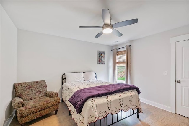 2241 N 16th Hwy, Whitesburg, GA 30185 - bedroom with light wood finished floors and a ceiling fan