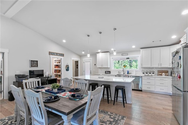 2241 N 16th Hwy, Whitesburg, GA 30185 - dining area with recessed lighting, light wood-type flooring, and vaulted ceiling