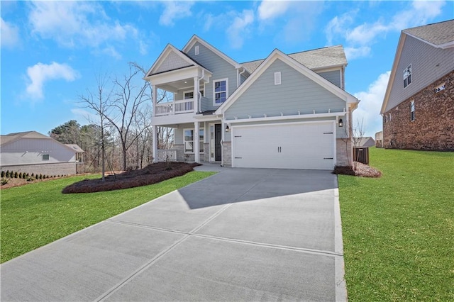 view of front facade with driveway, a garage, a balcony, a porch, and a front lawn