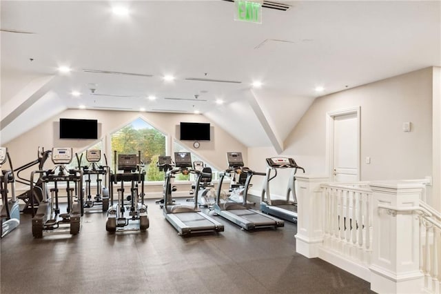 exercise room with lofted ceiling and recessed lighting