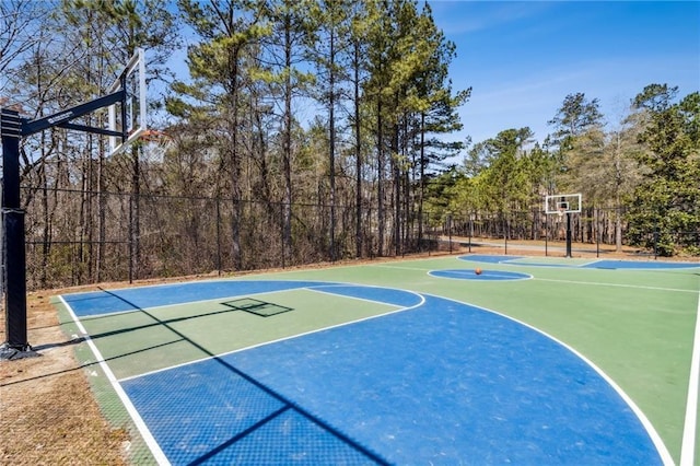 view of sport court with fence and community basketball court