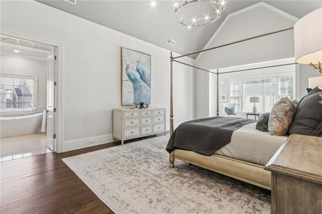 bedroom with baseboards, multiple windows, an inviting chandelier, and wood finished floors