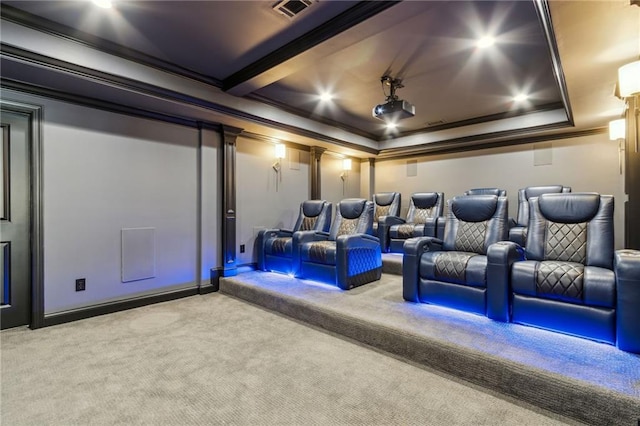 cinema featuring ornamental molding, visible vents, and carpet floors