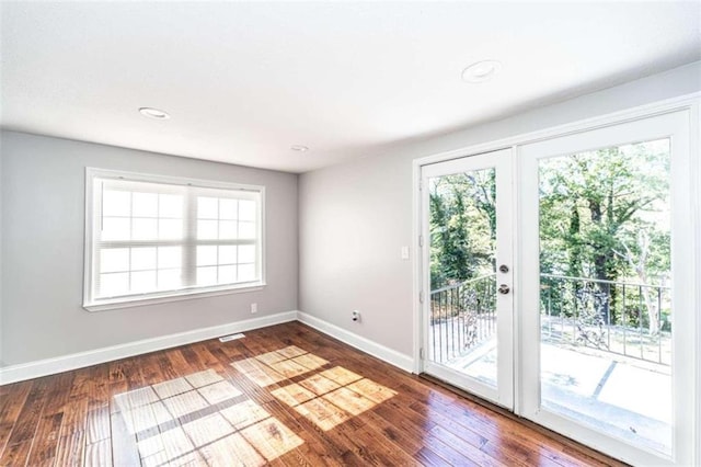 entryway featuring french doors and wood-type flooring