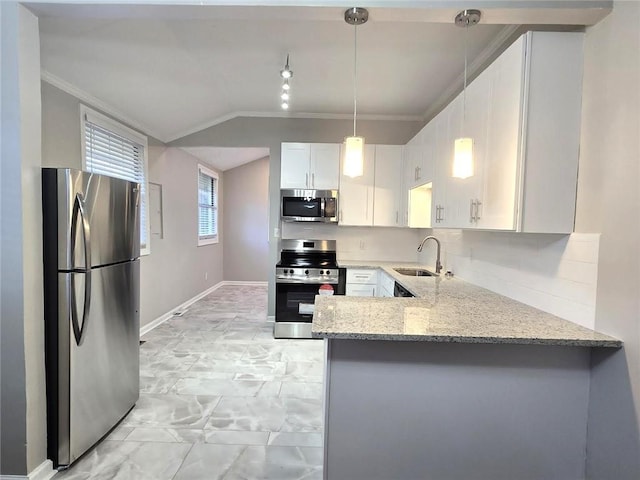 kitchen featuring stainless steel appliances, a peninsula, a sink, ornamental molding, and light stone countertops