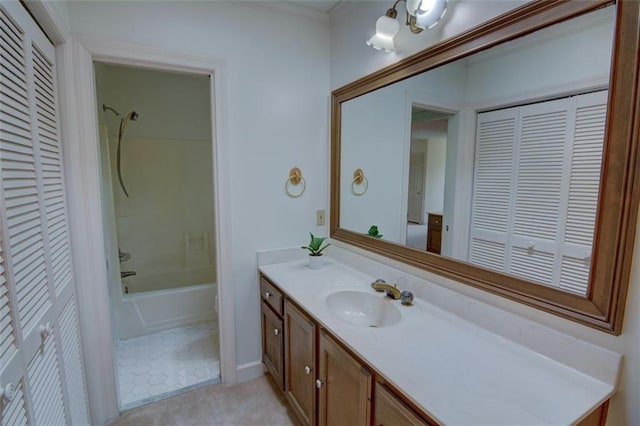 full bathroom featuring a closet, vanity, and shower / washtub combination