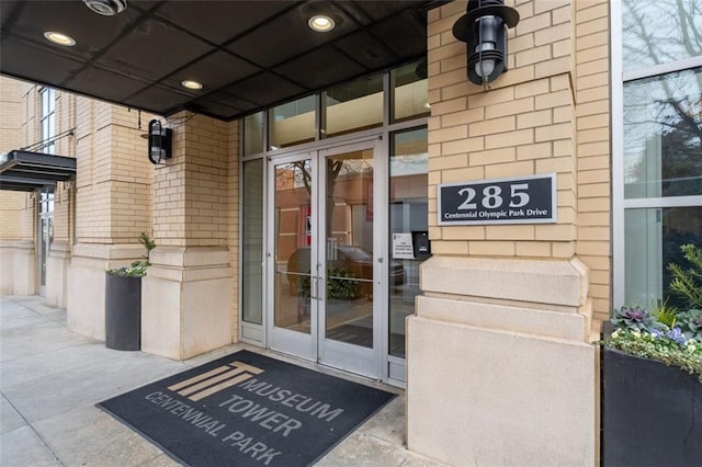 view of exterior entry featuring french doors