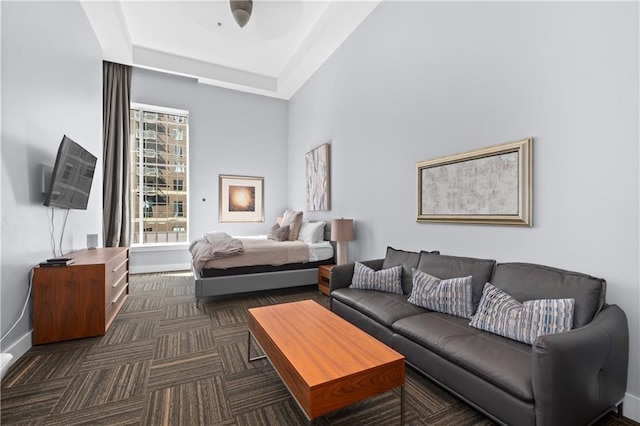 bedroom featuring dark carpet