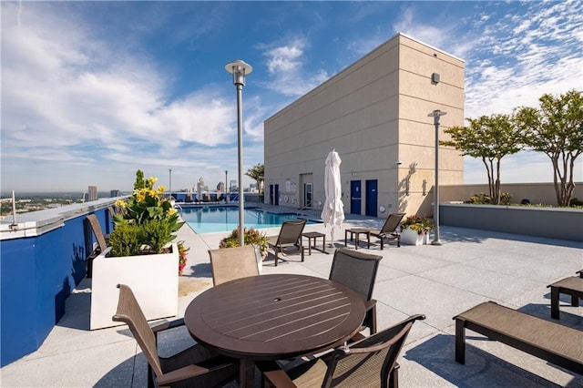 view of patio with a community pool