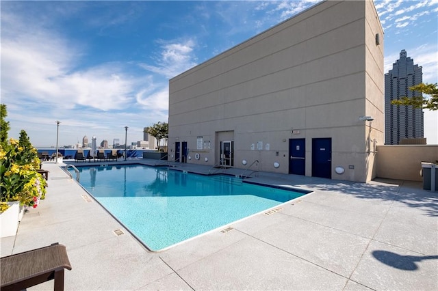 view of pool with a patio