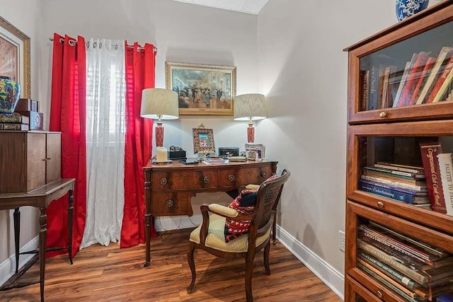 sitting room featuring hardwood / wood-style flooring