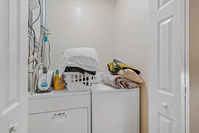 laundry area featuring washing machine and dryer