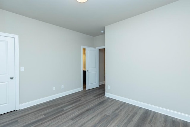 5587 Spring St, Flowery Branch, GA 30542 - empty room featuring baseboards and wood finished floors