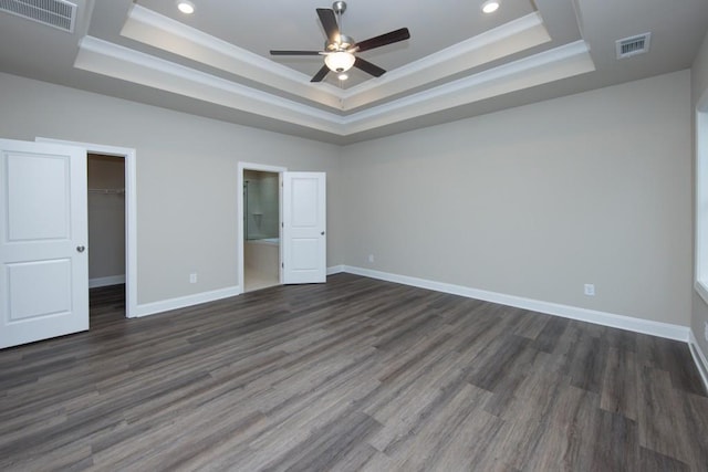 5587 Spring St, Flowery Branch, GA 30542 - unfurnished bedroom with recessed lighting, visible vents, and a raised ceiling