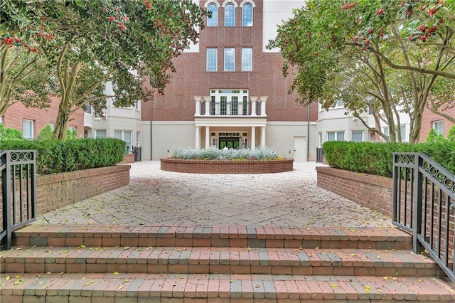 view of front facade with a balcony