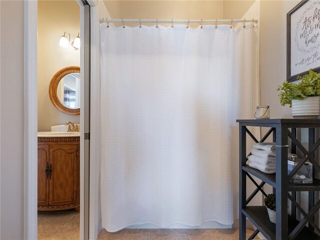 bathroom with vanity and tile patterned floors