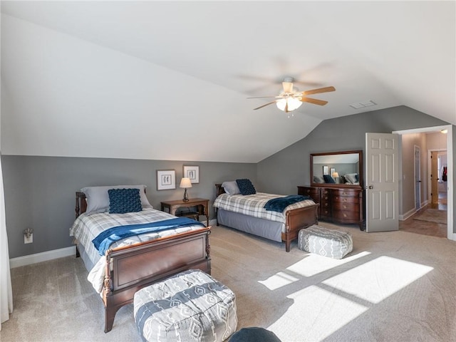 bedroom featuring ceiling fan, light colored carpet, and lofted ceiling