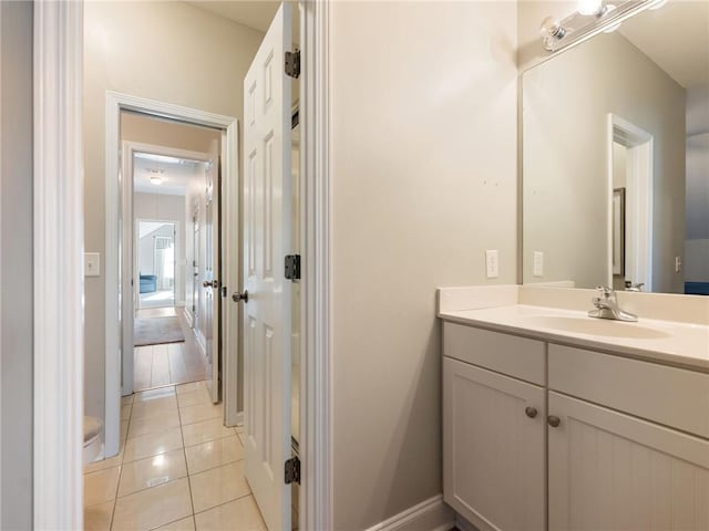 bathroom featuring tile patterned floors and vanity