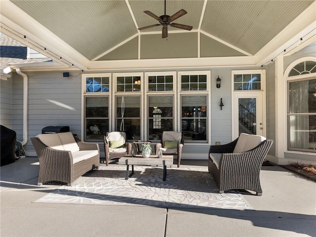 view of patio with ceiling fan and an outdoor living space