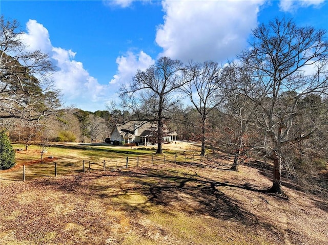 view of yard with a rural view