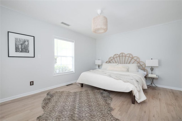 bedroom featuring light hardwood / wood-style floors