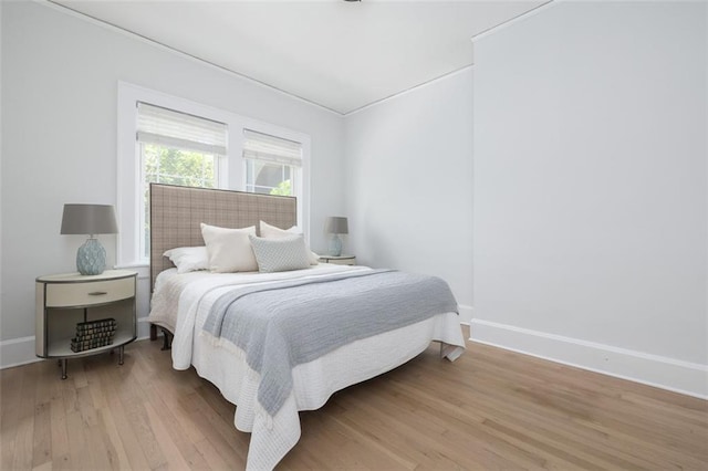 bedroom featuring light hardwood / wood-style floors