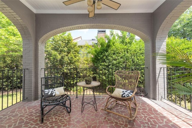 view of patio featuring ceiling fan