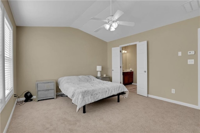 bedroom featuring vaulted ceiling, multiple windows, carpet flooring, and visible vents