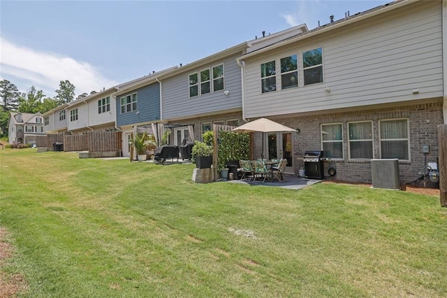 1969 Lanier Harbor Pt, Buford, GA 30518 - rear view of property with brick siding and a patio area