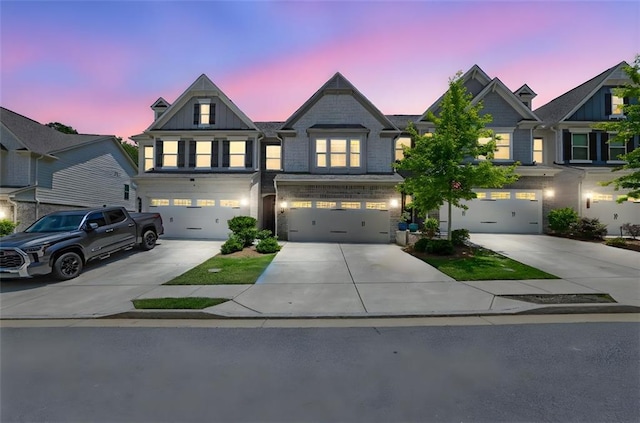1969 Lanier Harbor Pt, Buford, GA 30518 - view of front facade with concrete driveway and a garage