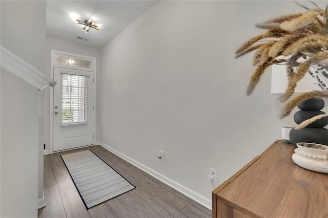 1969 Lanier Harbor Pt, Buford, GA 30518 - doorway featuring baseboards and wood finished floors