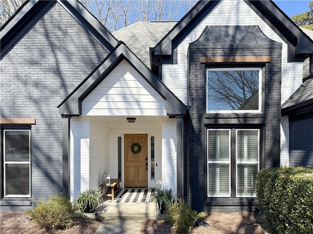 view of front of home with brick siding