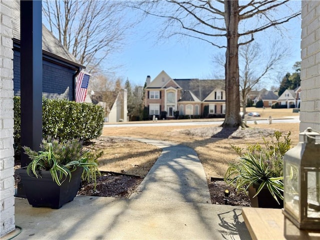 view of yard with a residential view