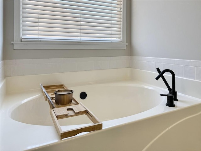 bathroom featuring a bathing tub