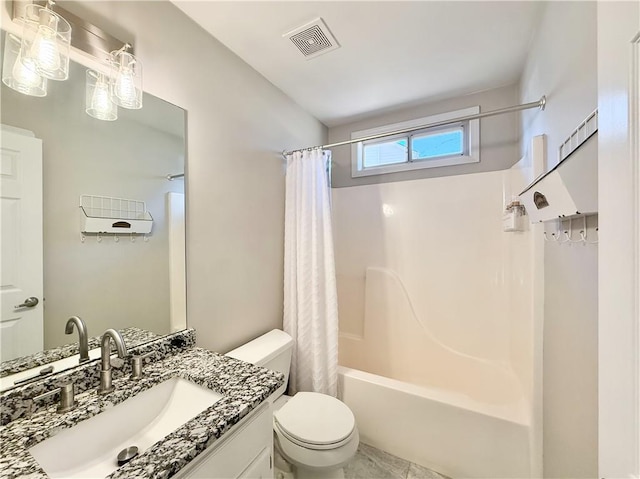 full bathroom with visible vents, vanity, toilet, and shower / bath combo with shower curtain