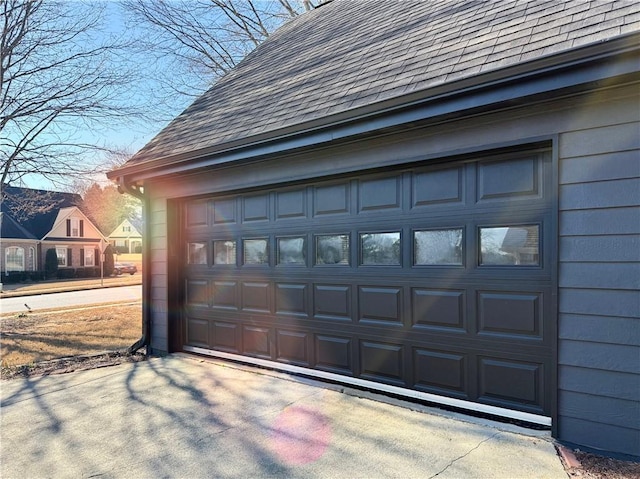 garage featuring driveway