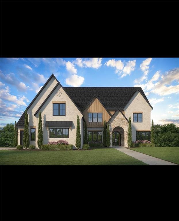 view of front of property featuring stone siding and a front lawn