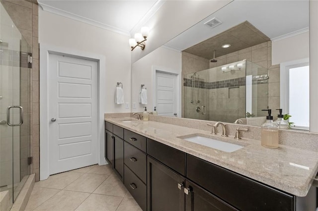 bathroom with tile patterned flooring, vanity, crown molding, and walk in shower