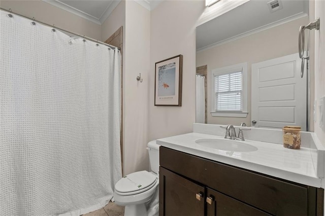 bathroom featuring crown molding, vanity, tile patterned floors, and toilet