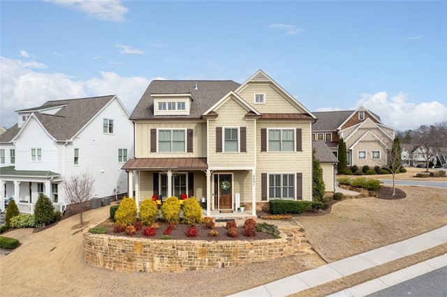 view of front of property featuring covered porch