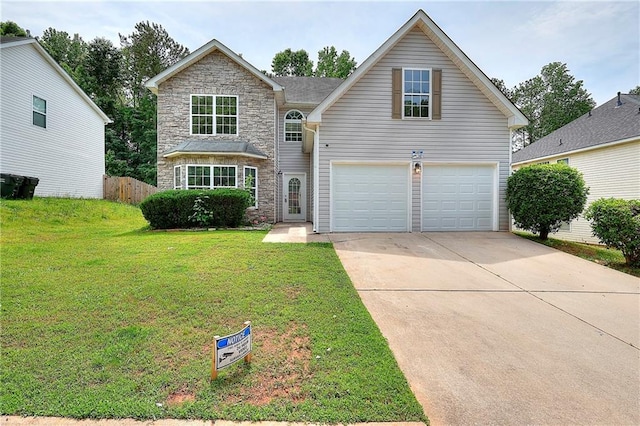 4041 Ash Tree St, Snellville, GA 30039 - traditional-style house with stone siding, driveway, and a garage
