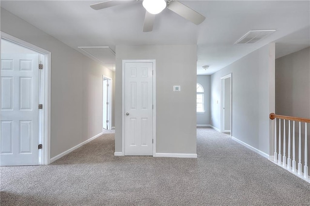 4041 Ash Tree St, Snellville, GA 30039 - spare room featuring attic access, carpet, a ceiling fan, and baseboards