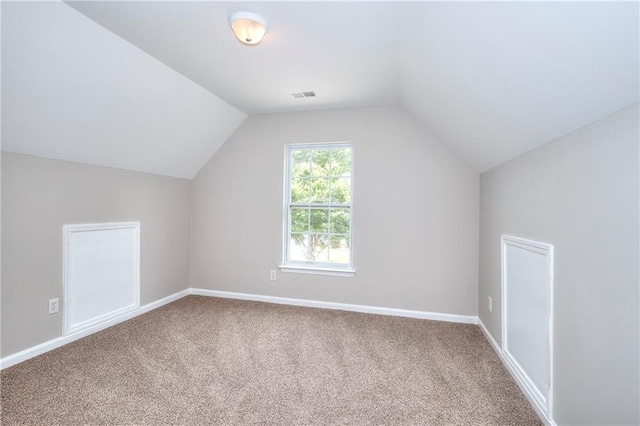 4041 Ash Tree St, Snellville, GA 30039 - additional living space with carpet flooring, lofted ceiling, and baseboards