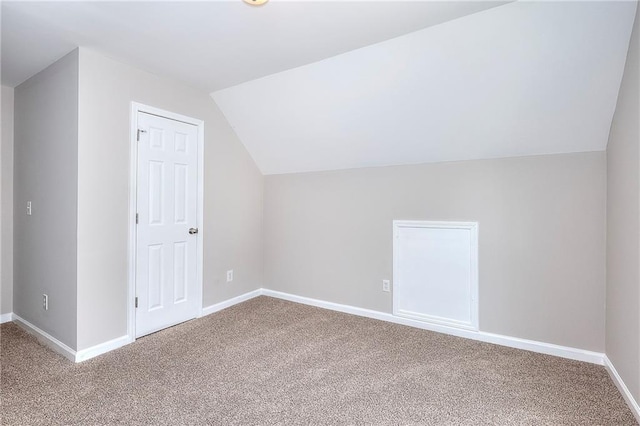4041 Ash Tree St, Snellville, GA 30039 - bonus room featuring lofted ceiling, carpet, and baseboards