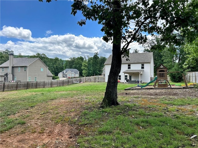 view of yard with a playground
